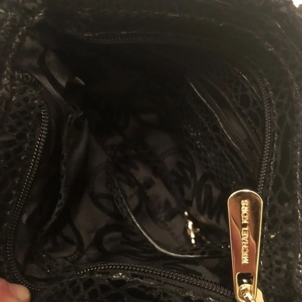 Michael kors snakeskin embossed leather clutch bag